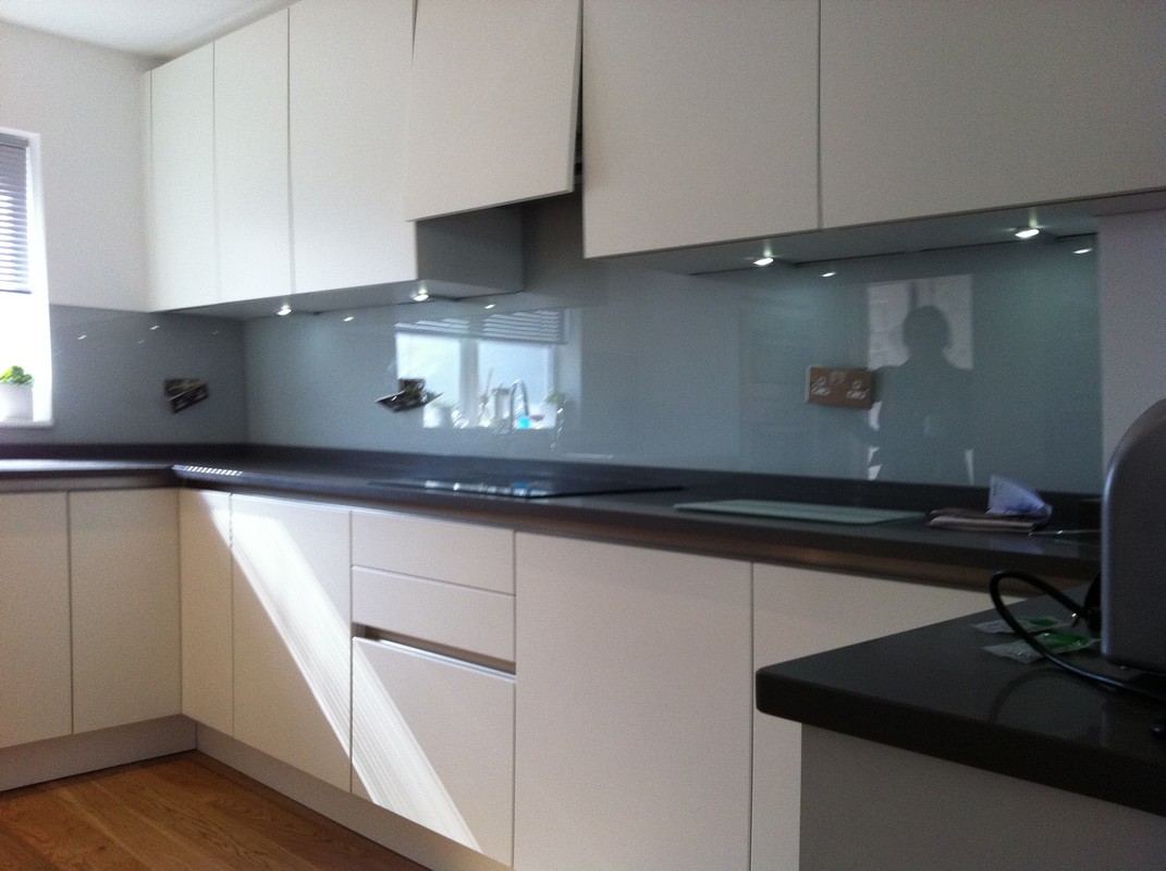 Grey glass kitchen splashback with LED lighting in Alexandra Palace