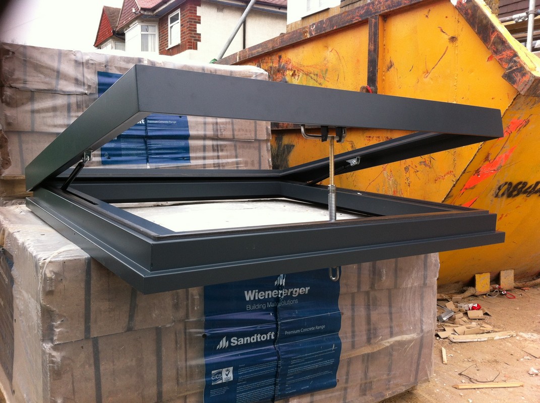 Opening flat roof skylight in anthracite grey installed in Alexandra Palace
